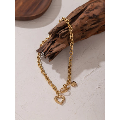 Golden Geometric Heart Necklace – Trendy Statement Jewelry