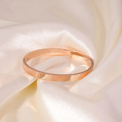 Stainless Steel Cross Bangle – Trendy & Luxurious Design