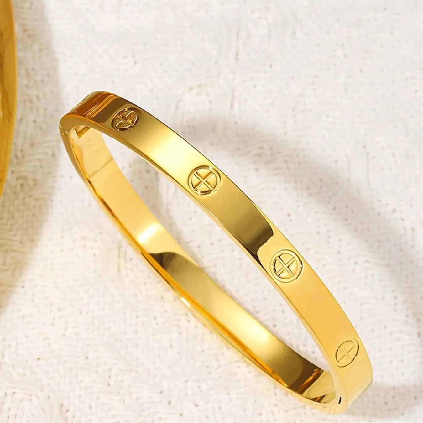 Stainless Steel Cross Bangle – Trendy & Luxurious Design