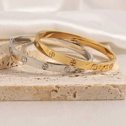 Stainless Steel Cross Bangle – Trendy & Luxurious Design