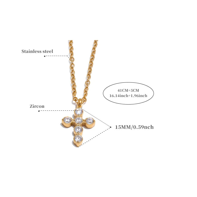Gold cross necklace with zircon stones on a white background, showing measurements and material details.