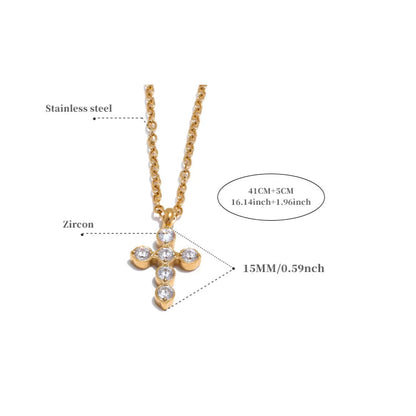 Gold cross necklace with zircon stones on a white background, showing measurements and material details.