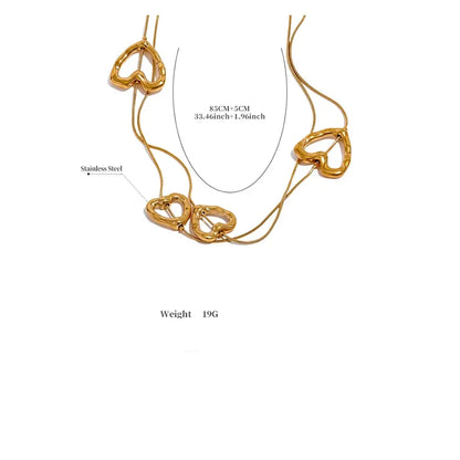 Gold necklace with heart-shaped links on a white background