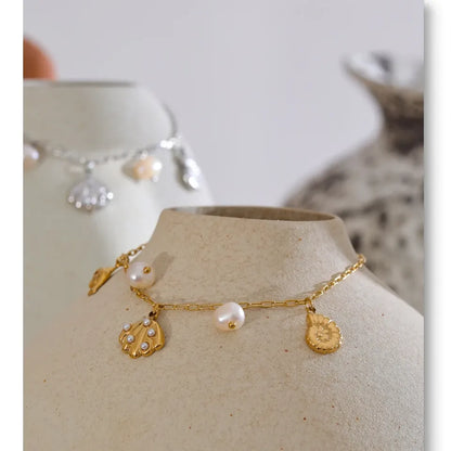 Ocean Charm Pearl Anklet – Shell Dolphin & Conch Design