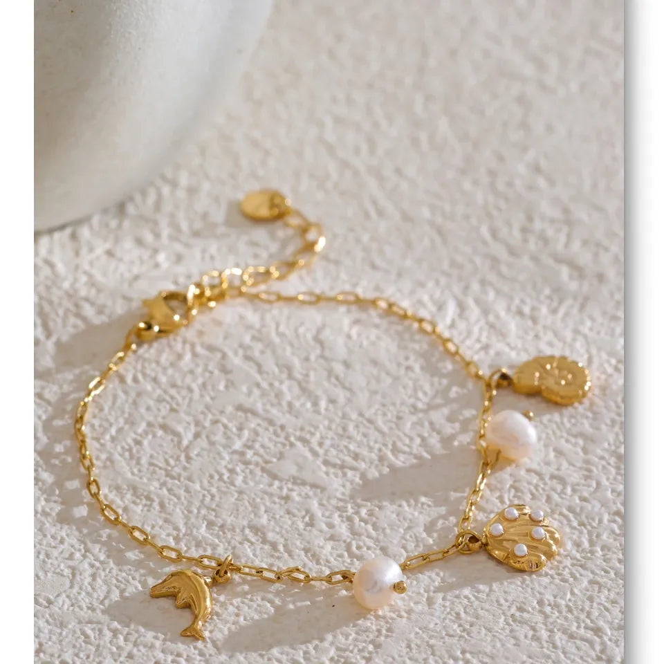 Ocean Charm Pearl Anklet – Shell Dolphin & Conch Design