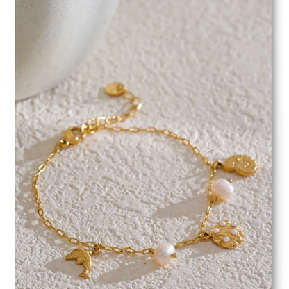 Ocean Charm Pearl Anklet – Shell Dolphin & Conch Design