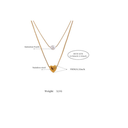 Gold necklace with heart-shaped pendant and measurement details on a white background