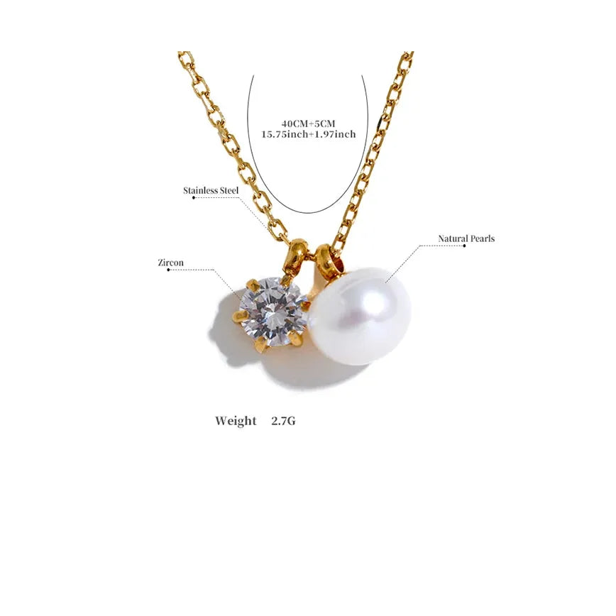 Gold necklace with a pearl and zircon pendant on a white background