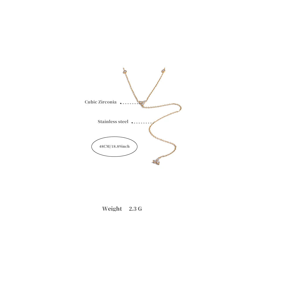 Gold necklace with cubic zirconia on a white background