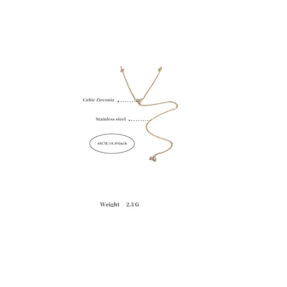 Gold necklace with cubic zirconia on a white background