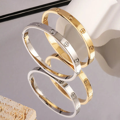 Stainless Steel Cross Bangle – Trendy & Luxurious Design