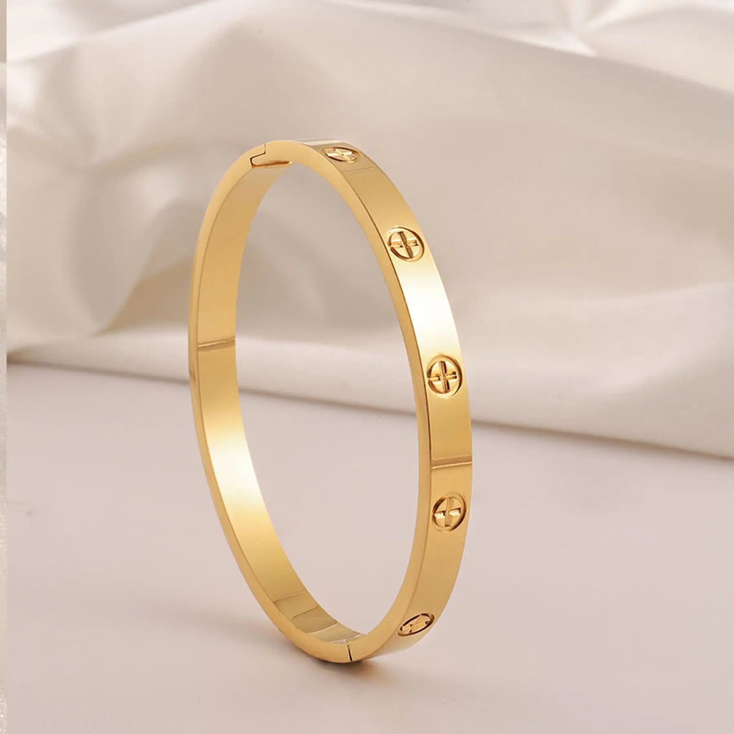 Stainless Steel Cross Bangle – Trendy & Luxurious Design