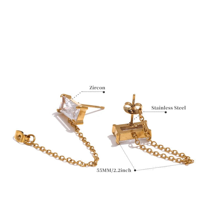 Gold chain necklace with zircon and stainless steel components on a white background